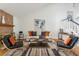 Bright living room with stone fireplace and comfortable seating at 3228 S Xanadu St, Aurora, CO 80014