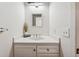 Clean and simple bathroom with a white vanity and single sink at 3228 S Xanadu St, Aurora, CO 80014