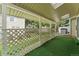 Covered patio with artificial turf and a lattice fence at 3228 S Xanadu St, Aurora, CO 80014