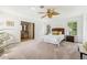 Spacious bedroom with ceiling fan and carpet at 3228 S Xanadu St, Aurora, CO 80014