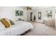 Primary bedroom with ceiling fan, carpet, and large windows at 3228 S Xanadu St, Aurora, CO 80014