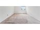 Well-lit bedroom with ample space and a window at 3228 S Xanadu St, Aurora, CO 80014