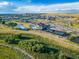 Aerial view of community amenities including pool, clubhouse, and pickleball courts at , Aurora, CO 80019