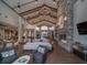 Bright and airy community room with a stone fireplace and ample seating at , Aurora, CO 80019