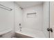 Clean bathroom with white tile and bathtub at 2227 Canyon Blvd # 258B, Boulder, CO 80302