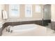 Relaxing bathroom with soaking tub and shower at 10877 Skydance Dr, Highlands Ranch, CO 80126
