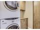 Convenient laundry room with stackable washer and dryer at 7600 Landmark Way # 1115, Greenwood Village, CO 80111