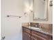 Modern bathroom with granite countertop and updated fixtures at 7600 Landmark Way # 1115, Greenwood Village, CO 80111