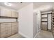 Large walk-in closet with custom built-ins and ample storage at 7600 Landmark Way # 1115, Greenwood Village, CO 80111