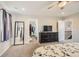 Main bedroom with walk-in closet and en-suite bathroom at 9884 Eagle River St, Littleton, CO 80125