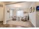 Bright living room with hardwood floors, fireplace, and large windows at 9884 Eagle River St, Littleton, CO 80125