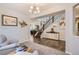 Spacious entryway leading to a staircase and living area at 9884 Eagle River St, Littleton, CO 80125