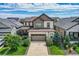 Aerial view of a two-story house in a residential neighborhood at 9884 Eagle River St, Littleton, CO 80125