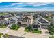 Aerial view of houses with solar panels and landscaping at 9884 Eagle River St, Littleton, CO 80125