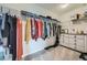 Large walk-in closet with ample shelving and hanging space at 9884 Eagle River St, Littleton, CO 80125