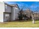 Home's backyard with deck and landscaping at 9362 Autumn Ash Ct, Highlands Ranch, CO 80126