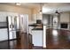 Kitchen with stainless steel appliances and hardwood floors at 9362 Autumn Ash Ct, Highlands Ranch, CO 80126