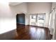 Large living room with hardwood floors and access to other rooms at 9362 Autumn Ash Ct, Highlands Ranch, CO 80126