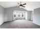 Spacious main bedroom with bay window and ceiling fan at 9362 Autumn Ash Ct, Highlands Ranch, CO 80126