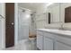Clean bathroom with shower, toilet, vanity, and updated fixtures at 3144 S Wheeling Way # 209, Aurora, CO 80014