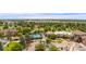 Aerial view of community with tennis courts and clubhouse at 3144 S Wheeling Way # 209, Aurora, CO 80014