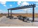 Pergola with multiple picnic tables and chairs at 2205 Alyssa St, Fort Lupton, CO 80621