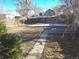 Backyard with concrete patio and a walkway at 1964 Galena St, Aurora, CO 80010