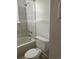 Bathroom with toilet, tub, and shower fixture at 1964 Galena St, Aurora, CO 80010