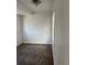 Simple bedroom with carpeted floor and a window at 1964 Galena St, Aurora, CO 80010