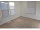 Bright bedroom with neutral carpet and window blinds at 1964 Galena St, Aurora, CO 80010