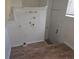Laundry room with linoleum floor and hookups at 1964 Galena St, Aurora, CO 80010