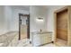 Bathroom featuring a large vanity and a walk-in shower at 11790 Huckleberry Dr, Franktown, CO 80116