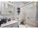 Simple bathroom with shower/tub combo and vanity at 481 Cragmore St, Denver, CO 80221