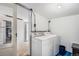 Basement laundry room with washer and dryer hookups at 481 Cragmore St, Denver, CO 80221