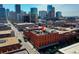 An aerial view of the building and its rooftop deck with city views at 1792 Wynkoop St # 502, Denver, CO 80202