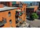 Aerial view of a building with a rooftop deck and city views at 1792 Wynkoop St # 502, Denver, CO 80202