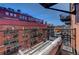 Private balcony with seating area and city views at 1792 Wynkoop St # 502, Denver, CO 80202