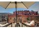 Private balcony offering city views and comfortable seating at 1792 Wynkoop St # 502, Denver, CO 80202