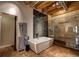 Spa-like bathroom with a large soaking tub, walk-in shower, and designer tile at 1792 Wynkoop St # 502, Denver, CO 80202