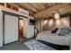 Bright bedroom with ensuite bathroom access and built-in shelving at 1792 Wynkoop St # 502, Denver, CO 80202