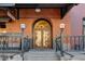 Main entrance to the building with brick facade and metal accents at 1792 Wynkoop St # 502, Denver, CO 80202