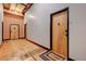 Building hallway with exposed wood beams and hardwood floors at 1792 Wynkoop St # 502, Denver, CO 80202