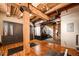 Spacious home gym with wood flooring and built-in storage at 1792 Wynkoop St # 502, Denver, CO 80202
