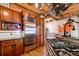 Modern kitchen with stainless steel appliances and custom wood cabinetry at 1792 Wynkoop St # 502, Denver, CO 80202
