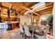 Modern kitchen with island, wooden cabinets, and exposed beams at 1792 Wynkoop St # 502, Denver, CO 80202