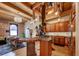 Open concept kitchen with stainless steel appliances and custom cabinetry at 1792 Wynkoop St # 502, Denver, CO 80202