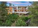 Stunning aerial view of a modern home nestled in a wooded landscape at 7 Elk Pointe Ln, Castle Rock, CO 80108