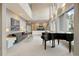 Modern living room with high ceilings and lots of natural light at 7 Elk Pointe Ln, Castle Rock, CO 80108