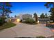 Modern home with two attached garages and landscaping at 7 Elk Pointe Ln, Castle Rock, CO 80108