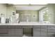 Large bathroom with double vanities, a soaking tub, and a walk-in shower at 7 Elk Pointe Ln, Castle Rock, CO 80108